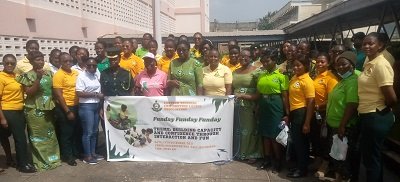 ●●Madam Freda Agyemang (in polo cap) with the immigration ladies