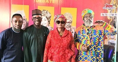 • Moderator of the debate, George Quaye in a group photograph with the aspirants