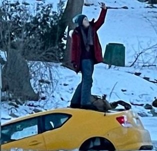 She took pictures of herself as her vehicle continued to sink