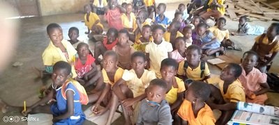• The pupils sit or sprawl on the floor to take lessons