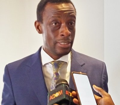 Mr Kwabena Okyere Darko-Mensah speaking to journalists