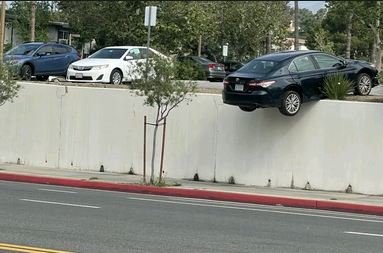 The vehichle avoided falling from the wall