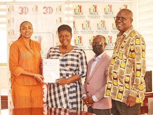 Inna Patty(left) in a photograph with representatives of NCCE