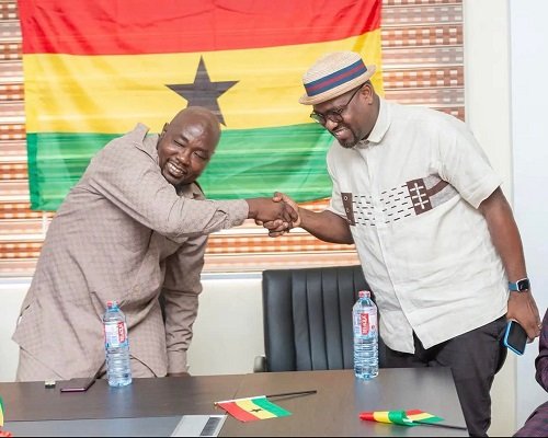 • A section of media and industry players at the launch. Inset: Abdul Fatawu Alhassan and Gilbert Aggrey in a handshake