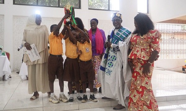 Kanda Estate Basic School overall winners lift their trophy