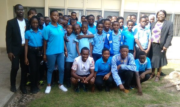 • Pupils and some staff members of the school with Mrs Quaitoo Acting Editor & Mr Zangina-Tong, News Editor of The Spectator Photo by Lizzy Okai