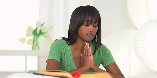 • A woman praying