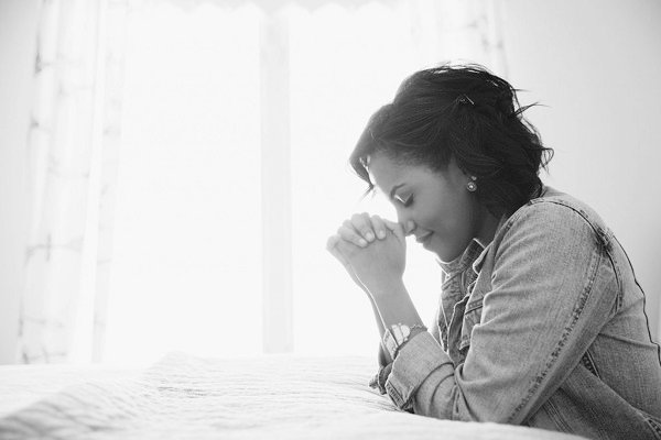 •A woman praying