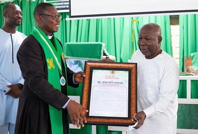 Mr Mike Similao received a citation for his dedicated service