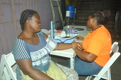 A woman checking her BP at the Kaneshie Community Centre