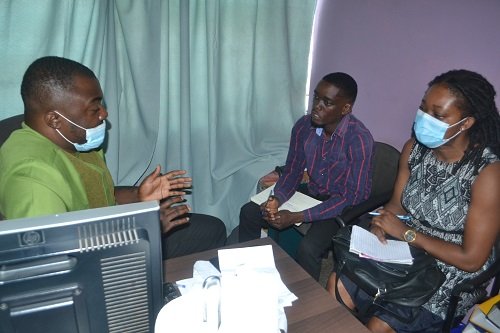 The repoters interviewing a doctor