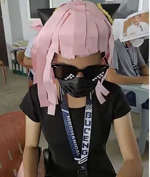 The students design fancy headgear to avoid cheating