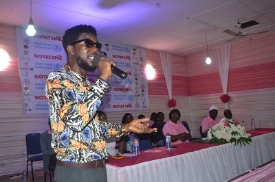 TiC addressing the gathering at Labone Senior High School