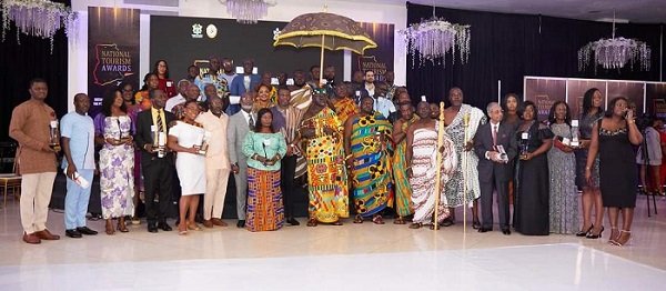 Award winners in a group photograph with dignitaries at the event