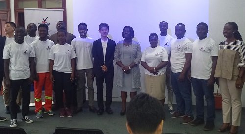 The cohort in a photograph with stakeholders