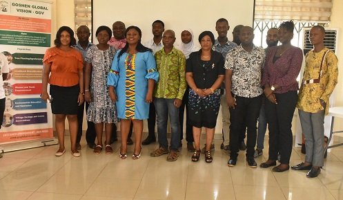 • Madam Mary Perpetua Kwakuyi (blue) with some Heads of Department at EKMA.