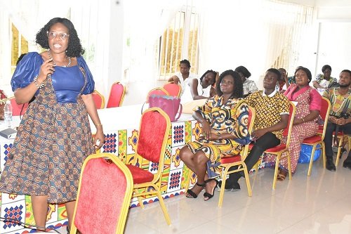 • Prof. Azuah (standing) talking to the tutors