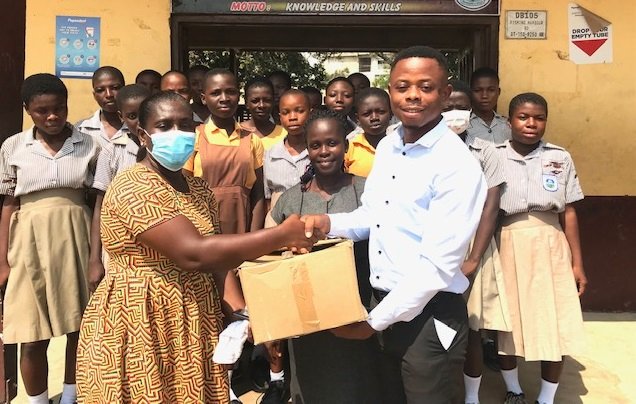 • Mr. Derick Mintah (right) presenting the package to Ms Hammond
