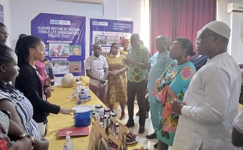 • The MCE and some digintaries interacting with beneficiaries at the programme