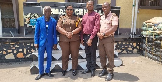 • Rev. Frimpong Mensah (left), a member of IPCA in Ashanti Region, Rev Supt. Stella Katso (2nd left), Prison Chaplain, Supt. Bukari (right) and Mr. Owusu Barimah after the presentation