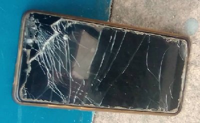 Raymond Appiah's cracked phone