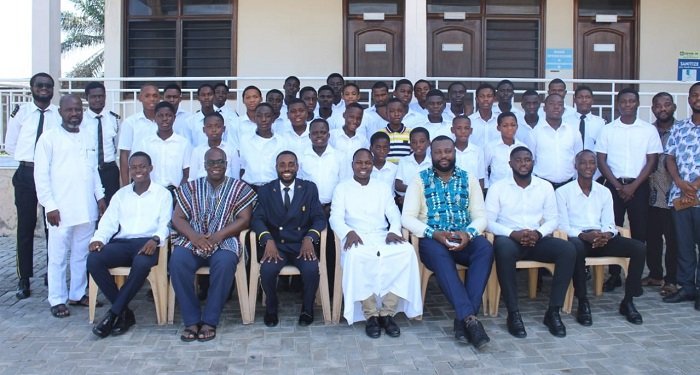 Rev Father Edward Agbeobila (middle) with the Cadets and KSJI executives after the ceremony