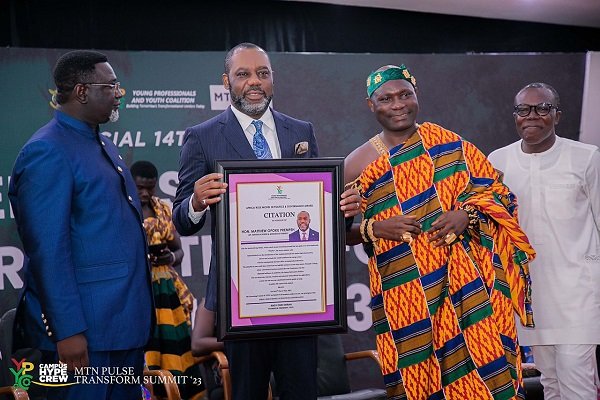 Dr Mathew Opoku Prempeh displaying his citation.