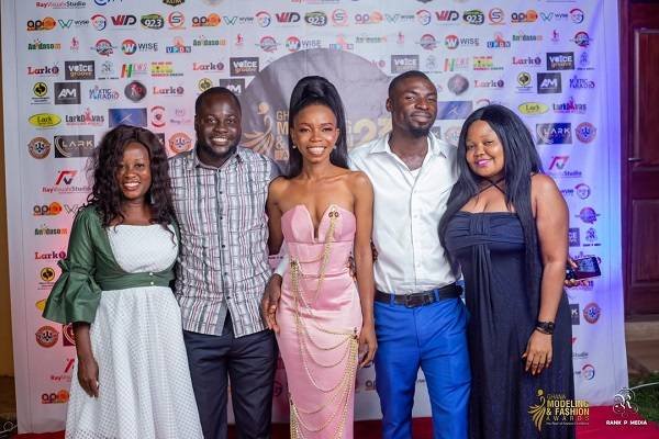 Ms Larkuor(middle) in a pose with other guests at the event