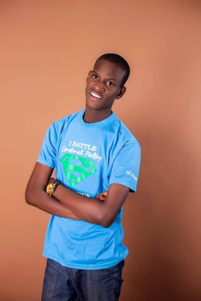 • A smiling Nii Anyetei