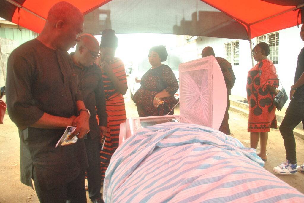 Former News Editor, James Addy and former Editor of The Spectator, Emmanuel Amponsah pay their last respect to the late Castro