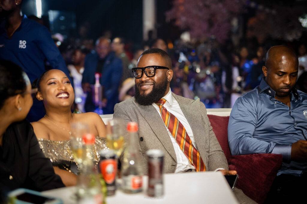 • Chief Executive Officer of the McDan
Group of Companies Daniel McKorley
in a chat with some of the patrons