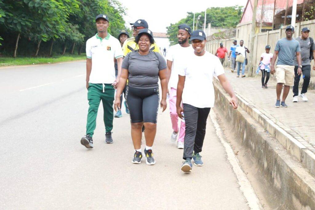 Members walkin briskly to be in the lead