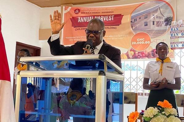• Pastor Sessou preaching the sermon