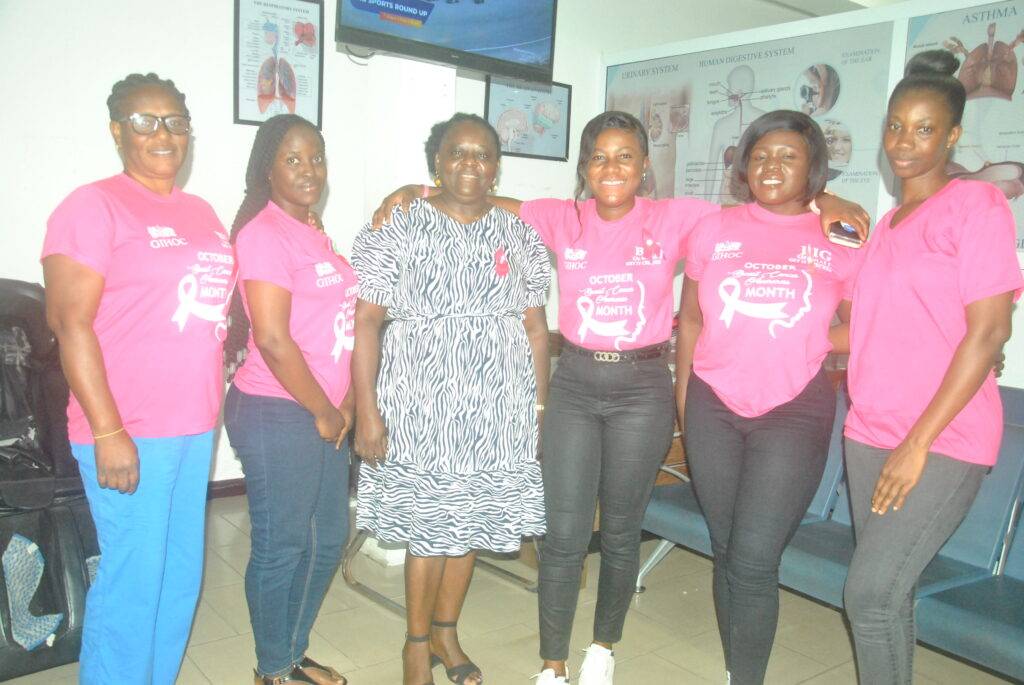 Mrs Georgina Quaittoo [third left] with the health professionals