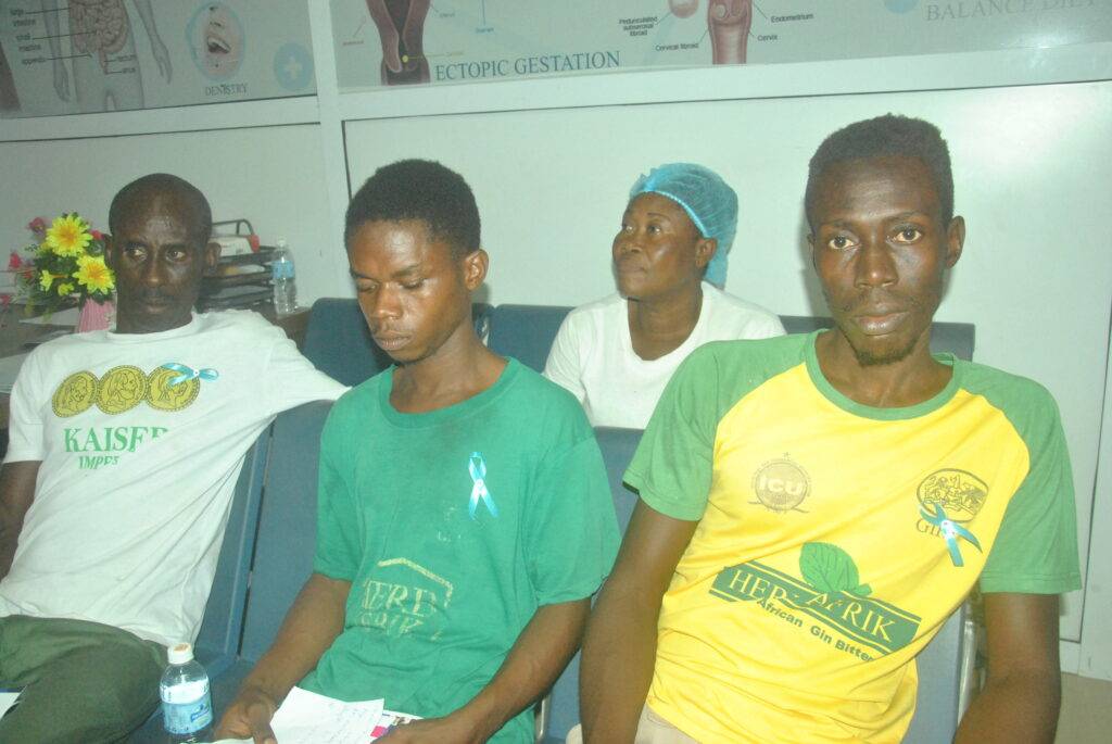Some workers waiting to be screened