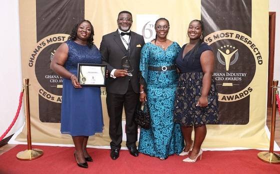 • Dr Andy Osei Okrah with Mrs Ursular Owusu-Ekuful,(second from right), His wife,Alice and daughter Hilary (right)after the award.
