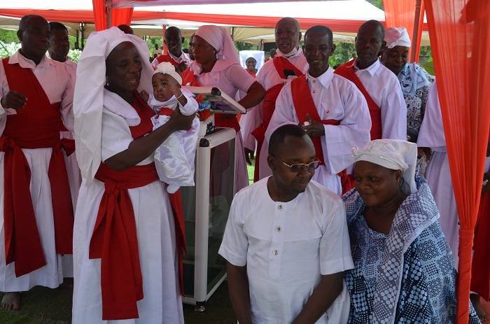 Prophetess Ataa Nkansah dedicating couple's baby at the programme