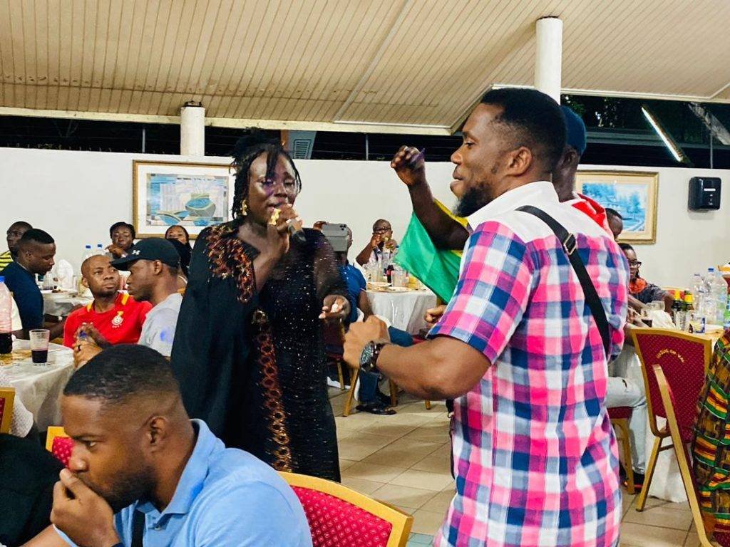 Celine of The Select Singers from Ivory Coast entertaining some Ghanaian fans