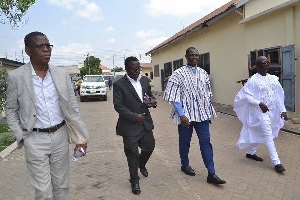 • Rev Ocquaye [second from right] with Mr Martin
Adu-Owusu (second left) Mr Dave Agbenu, [ieft]
and Mr Osman after the thanksgiving service