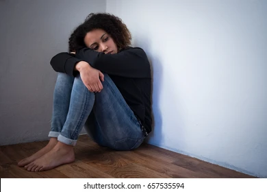 • A young girl feeling lonely