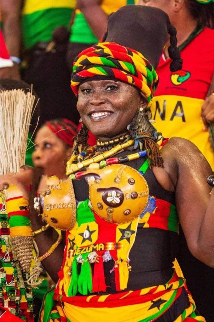 This lady looks resplendent in a specially designed attire with calabash