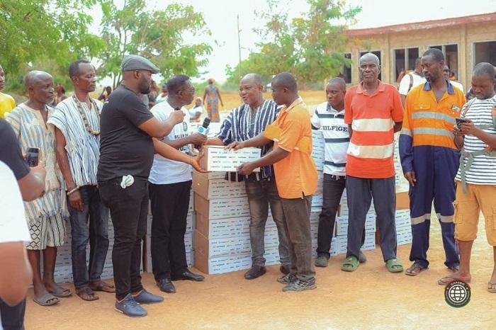 GHASBO team presenting items to victims