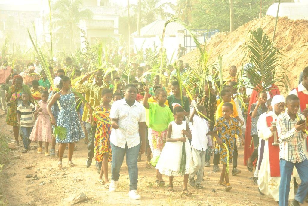 Members of the St Sylvanus Catholic Church Pokuase marching through the principal streets of Pokuase Photo Lizzy Okai