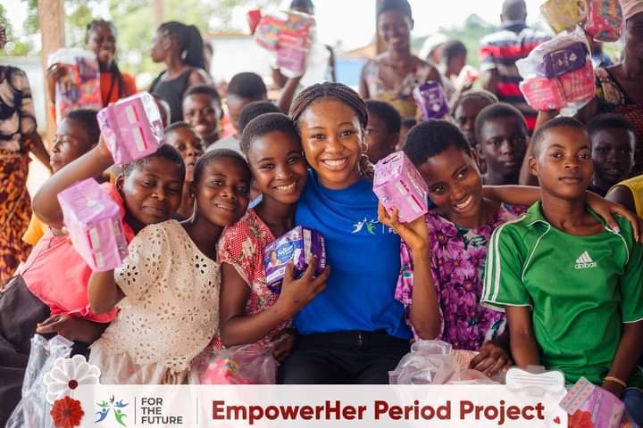 Ms Keziah Sanie with some of the beneficiaries
