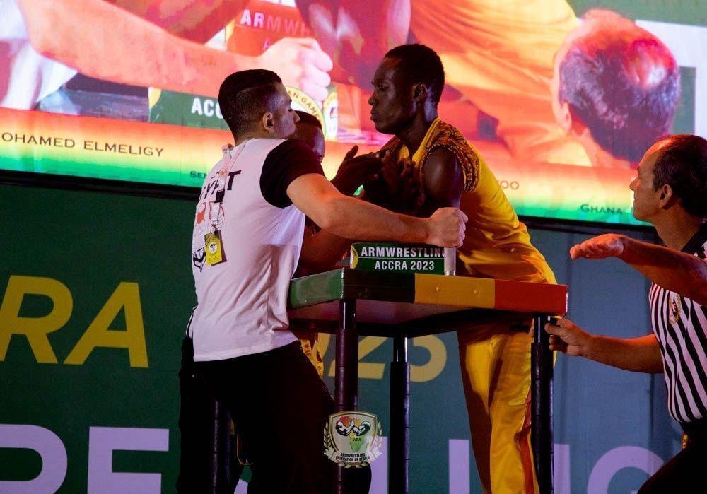 An armwrestling final between Ghana (right) and Egypt