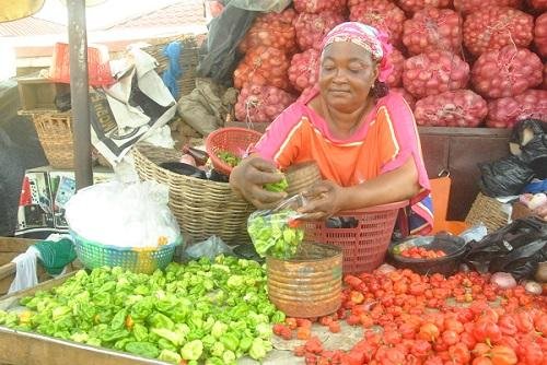 • Aunty Alimatu Sulemana selling vegetable Photos Okai Elizabeth