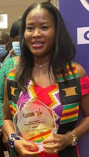 Catherine with one of her awards