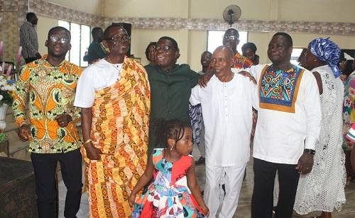 Elder Abraham Amoah Larbi(second from left) with a retired officer and some members of the church