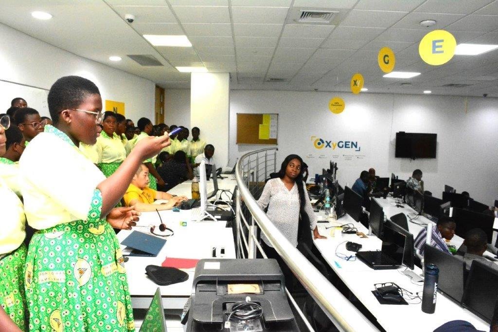 ICT Student from Aburi Girls SHS asking a question during their tour of MTN Network Monitoring Center