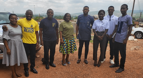 Director of Education Shai Osudoku District, Ms Harriet Lomotey (fourth from right), National Director of Ghana Reads Initiative, Mr Albert Koomson( 2nd from right) in a group picture with other executives after the program
